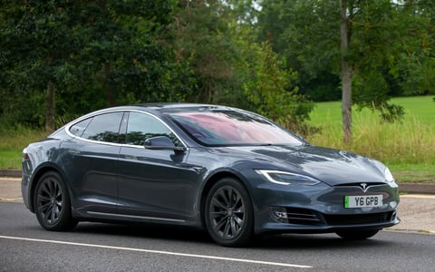Milton Keynes,UK - July 19th 2023:  2017 Tesla Model S electric car travelling on an English road