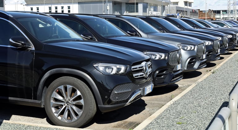 Mercedes Benz cars on display outside dealer