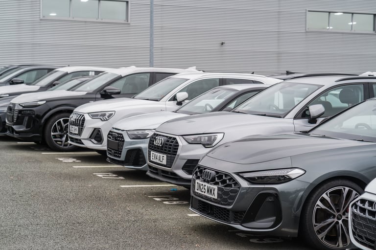 Luxury car fleet in dealership forecourt