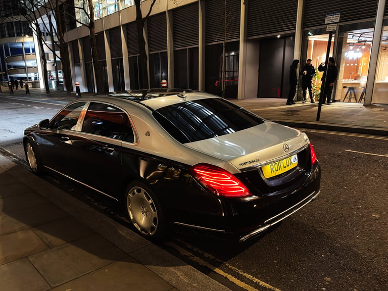 Luxury Mercedes taxi at night